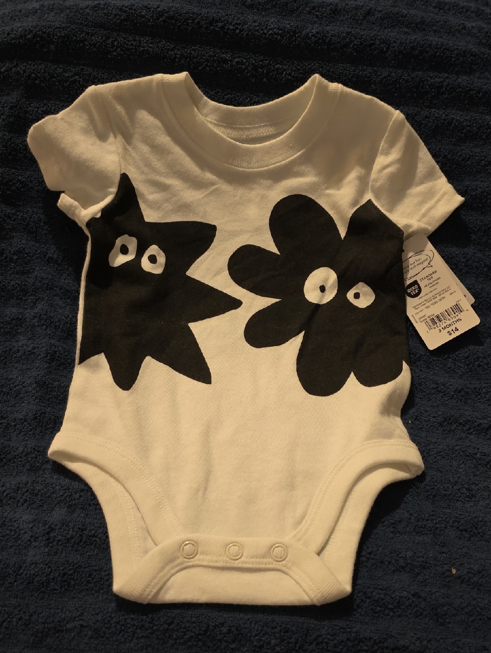 okie dokie White One-Piece Bodysuit with Black Floral Faces